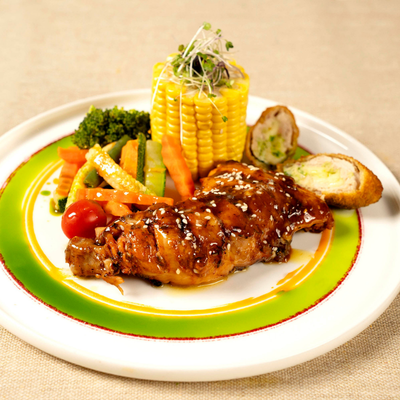 Honey Glazed Chicken Steak Accompanied with Cordon Bleu and Corn on the Cob